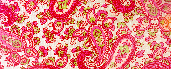 Brightly colored pink paisley.