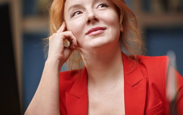 istock Day dreaming businesswoman at her office 1492422852