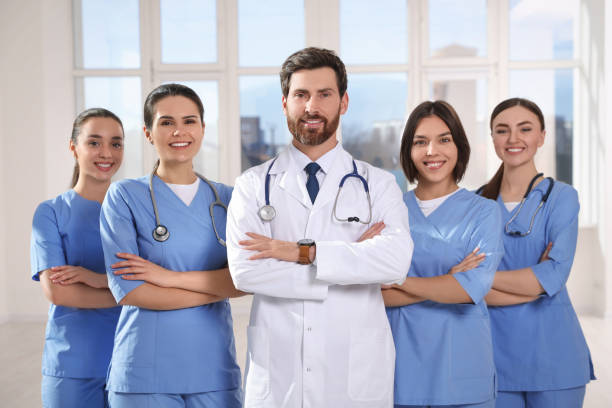 istock Team of professional doctors in clinic hallway 1492425504