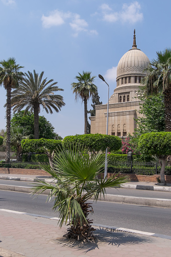 Cairo, Egypt - April 30, 2023: Avenue and building of the Mostafa Kamel Museum, in the historic center of the city