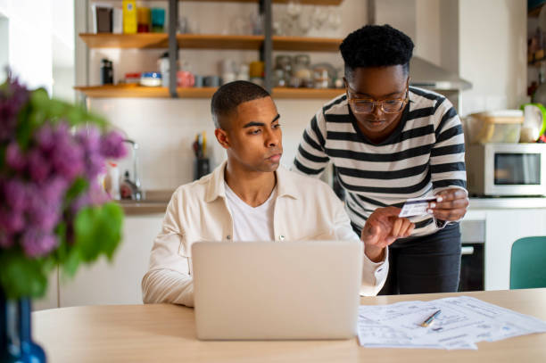 istock Young African American couple shops online 1492433760