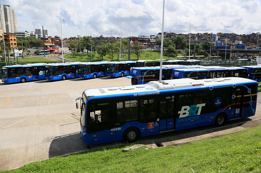 salvador, bahia, brazil - may 17, 2023: Buses of the BRT transport system are seen in a parking lot in the city of Salavdor.