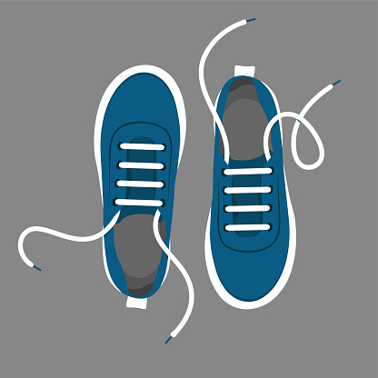 A pair of blue sneakers with untied laces and thick white soles. View from above.