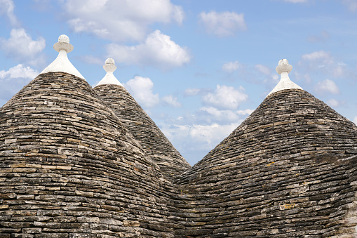 closeup of the roofs of the trulli unique houses in Alberobello, Apulia, Italy
