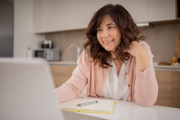 istock Mature woman working from home 1492452452
