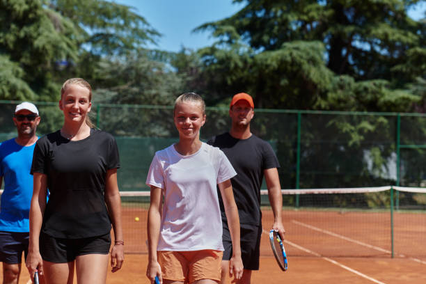 istock Tennis club together after hard training, showing their dedication, hard work, and teamwork. 1492453458