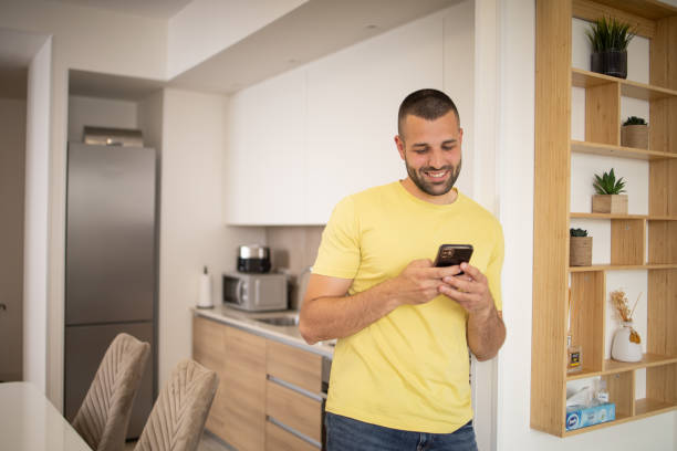 istock Portrait of a young man using smartphone 1492456390