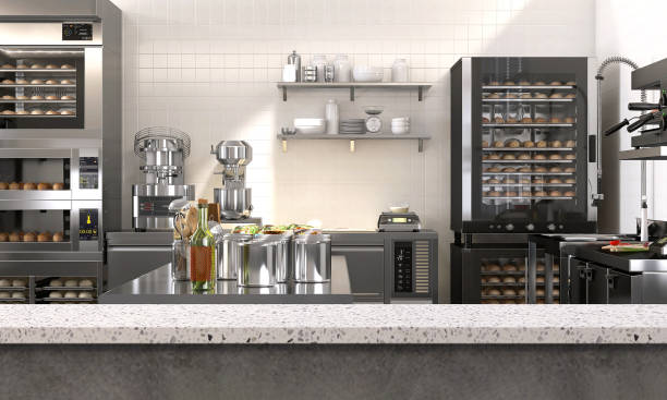 istock Empty clean white terrazzo top island table counter in commercial, professional bakery kitchen, stainless steel convection, deck oven, freezer, refrigerator, shelf, cabinet, ingredient 1492460502
