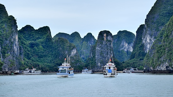 Ha Long Bay is located in Ha Long City, Quang Ning Province, Vietnam. It is a typical limestone karst landform bay. The whole bay has about 120 kilometers of coastline, a total area of about 1553 square kilometers, and about 2000 islets.\nAbout 434 square kilometers of the central area (containing 775 islets) is a World Natural Heritage Site. The scenery is beautiful and charming.\nIt is a national scenic spot in Vietnam. Countless foreign tourists come here for sightseeing.