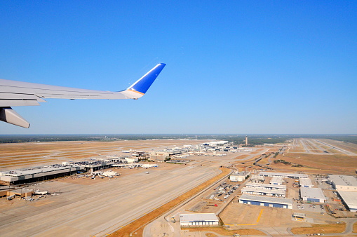 Houston, TX, USA- September 9, 2011: Here is the Aerial View of George Bush Intercontinental Airport from the window of a taking-off Boeing 737 aircraft of Untied Airlines.