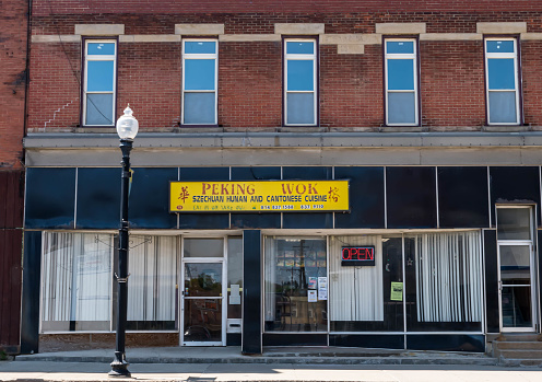 Kane, Pennsylvania, USA May 9, 2023 The Peking Wok, an Oriental restaurant on North Fraley Street on a sunny spring day