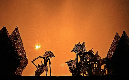 a beautiful silhouette of wayang, the Indonesian traditional puppet show especially in Java region which made from goat's skin