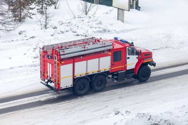 istock A red fire truck or Fire engine drives down a snowy street in winter 1492476091