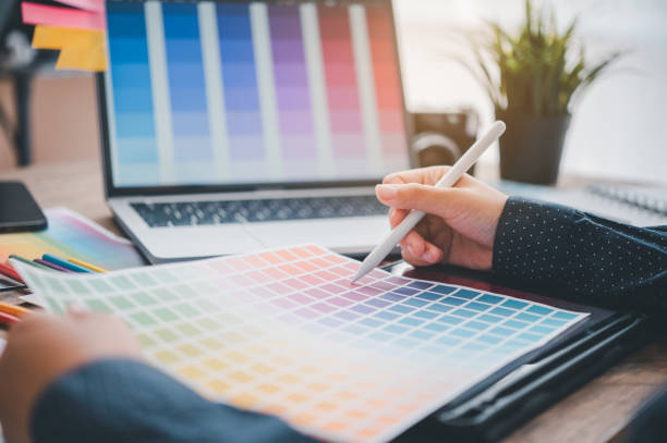 istock Graphic designer architects who work with laptops and color comparison tables for design work. 1492485462