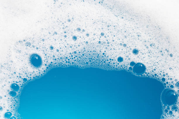 istock Detergent foam bubble on wate. Blue background, Soap sud 1492489489