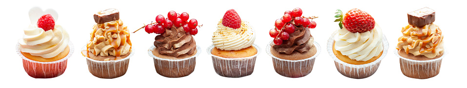 Set of chocolate, vanilla and salted caramel cupcakes with fresh berries and peanuts isolated on white background, png