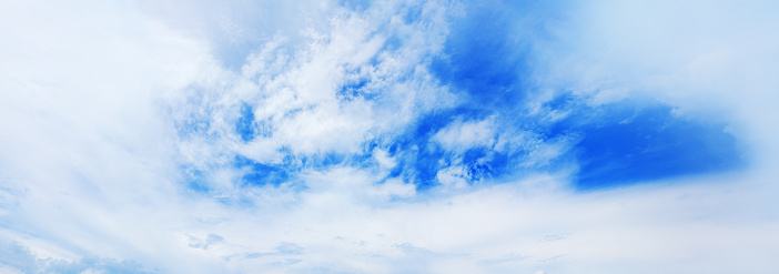 White cirrus clouds blue sky background, fluffy cumulus cloud texture, beautiful cloudy skies wide panoramic view, cloudscape panorama, sunny heaven, cloudiness weather backdrop, ozone layer, overcast