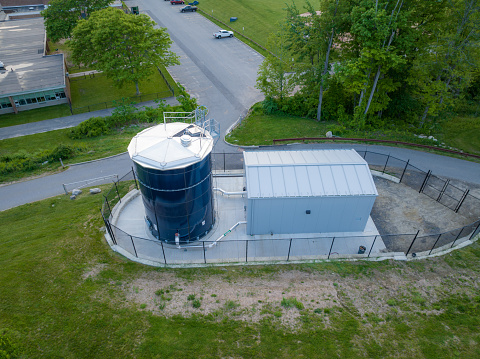 Photo of a blue steel, metal, industrial water tank, industries, commercial, municipal.