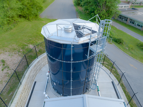 Photo of a blue steel, metal, industrial water tank, industries, commercial, municipal.