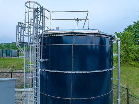 Photo of a blue steel, metal, industrial water tank, industries, commercial, municipal.