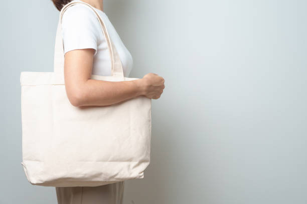 istock Woman with Eco Shopping tote bag with Copy space for text. Environmental Protection, Zero waste, Reusable, Say No Plastic, Sustainability, Eco Friendly, World Environment day and Earth day concept 1492500531