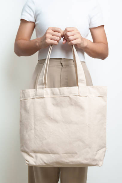 istock Woman with Eco Shopping tote bag with Copy space for text. Environmental Protection, Zero waste, Reusable, Say No Plastic, Sustainability, Eco Friendly, World Environment day and Earth day concept 1492500536