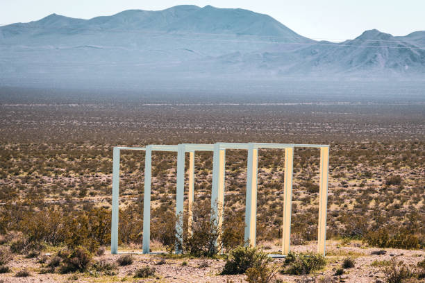Rhyolite, Nevada USA - April 10, 2023: Located just outside of Death Valley National Park, Rhyolite Ghost Town is home to its historic architectural ruins as well as a unique art display.