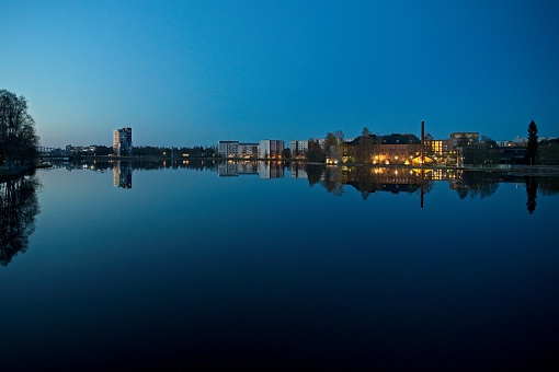 Night photo of Oulu river in Oulu Finland.