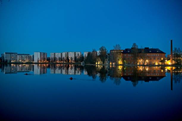 Night photo of Oulu river in Oulu Finland.