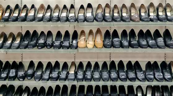 women's shoes, women's shoes on a store shelf. shop window. shoes shop. shelves shoe shop