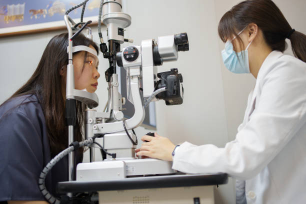 istock Doctor checking girl eyesight 1492513805