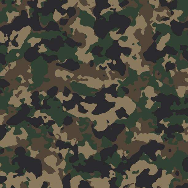 istock Green hunting camouflage. Military camouflage. 1492514805