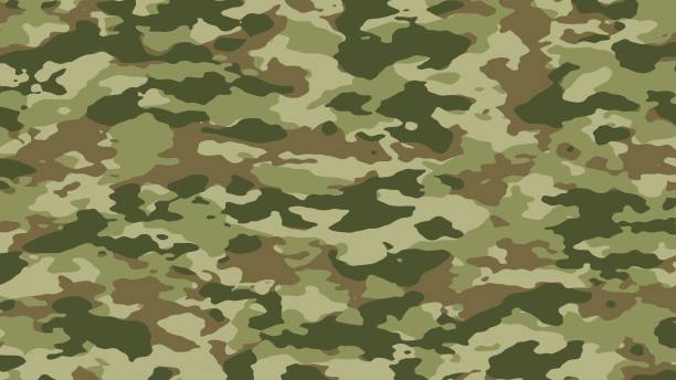 istock Green hunting camouflage. Military camouflage. 1492514990