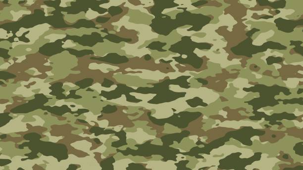 istock Green hunting camouflage. Military camouflage. 1492515011