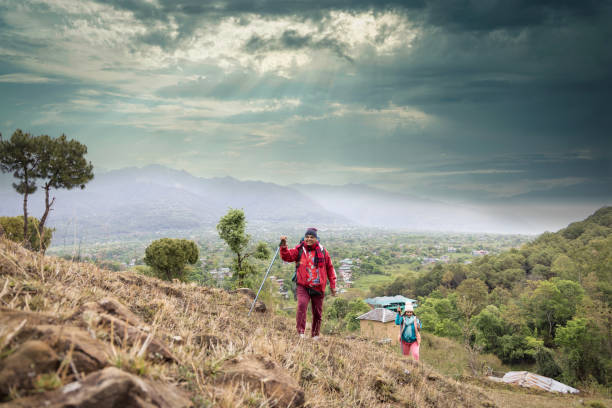 istock Happy couple trekking on a mountain. 1492518057