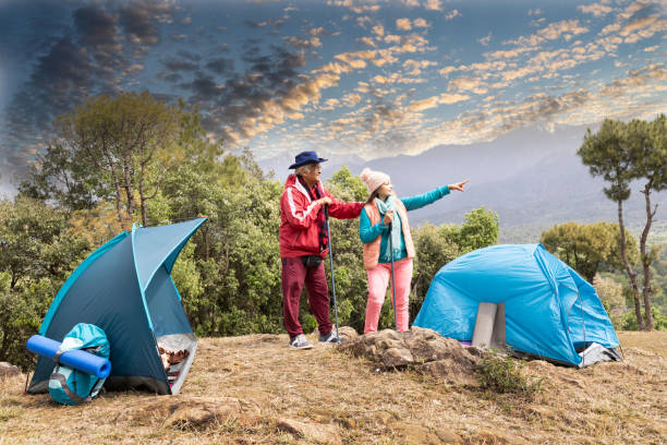 istock Couple taking selfie at campsite. 1492518264
