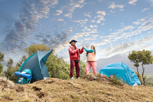 istock Couple taking selfie at campsite. 1492518267