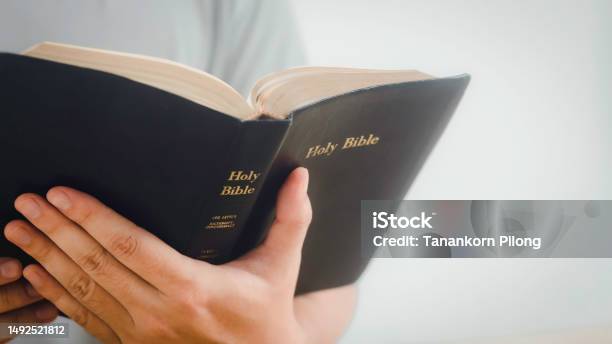 Believers Are Reading The Holy Bible Every Day And Every Time In A Private Room The Idea Of Studying More About God Through The Bible Stock Photo - Download Image Now