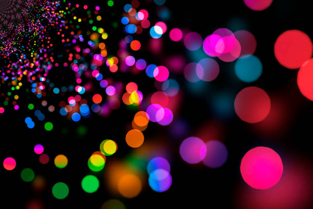 Blurred night city lights. Defocused photo of street lighting with colorful bokeh, light white, red, blue and orange