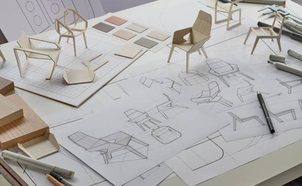 istock Designer sketching drawing design development product plan draft chair armchair Wingback Interior furniture prototype manufacturing production. designer studio concept . 1492528377