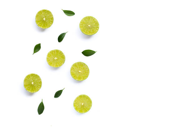 istock Limes with leaves isolated on white. 1492528872