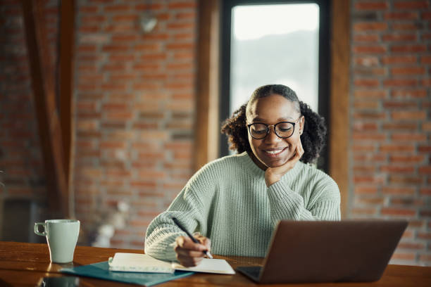 istock Happy African American graphic designer working at casual office. 1492530884