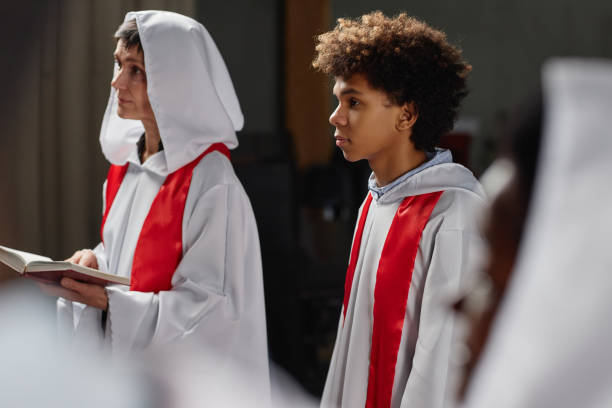 Vienna, Austria- Dec 4, 2024\nOfficials carry crosses into St Stephens Cathedral in Vienna. The Cathedral is very busy in the Advent period leading up to Christmas. These men are setting up equipment before the main mass and tourist influx of the morning takes place.