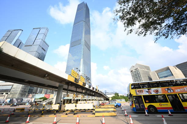 Bus and Western Harbour Crossing, hong kong - 05/20/2023 17:45:30 +0000.The Western Harbour Tunnel (WHT) directly links expressways and road networks on both sides of the harbour. WHT also links the New Territories and, via various control points, connects to many superhighways in Guangdong, and Macao.