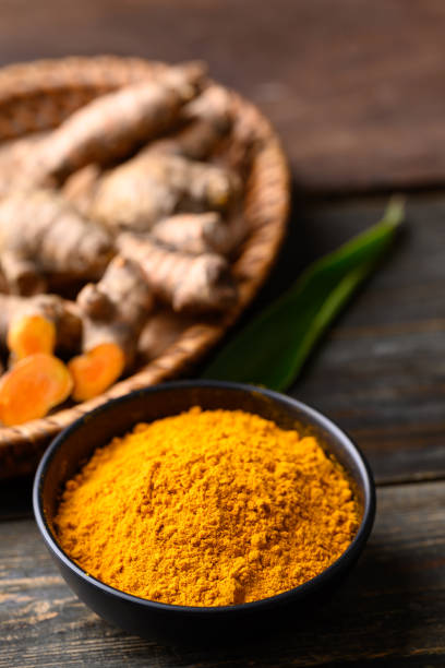 istock Turmeric powder and fresh turmeric (Curcuma, curcumin) 1492535589