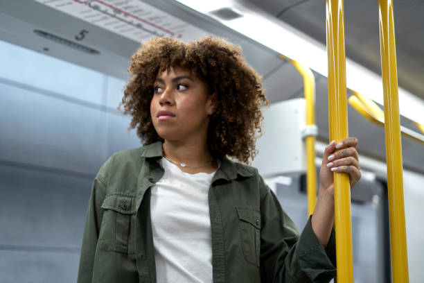 istock Young afro woman traveling by underground 1492542697