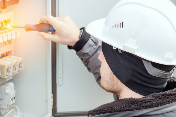 istock Close-up portrait of energy engineer in hard hat at work. 1492543844