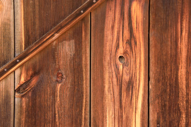 istock Background pattern, old brown boards painted with wood impregnation, filling the frame 1492544530