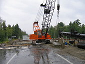 crawler crane lifting concrete blocks