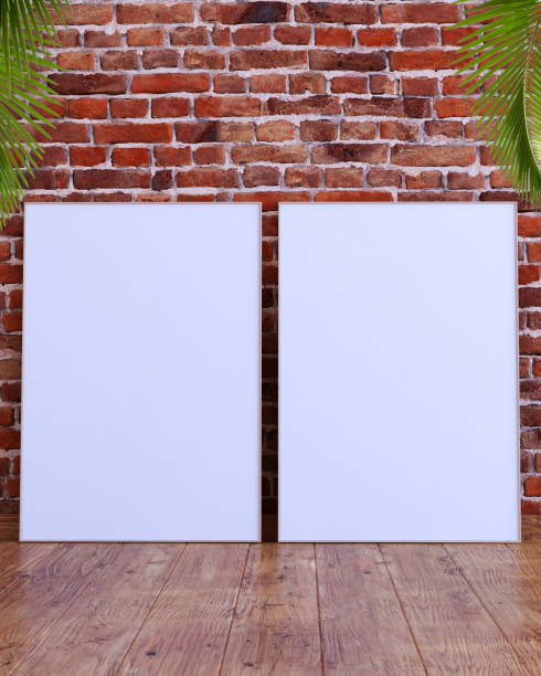 istock 2 vertical frame mockup on a red brick wall with wooden floor, palm leaves and green leaf plant pot 1492548175